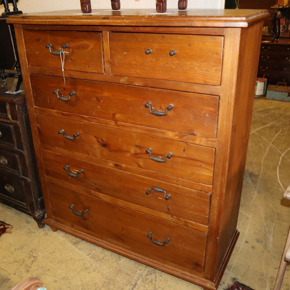 A stained pine chest of drawers, W.115cm, D.92cm, H.134cm
